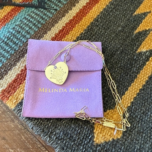 Melinda Maria Jewelry - Gold tone heart necklace with purple stone